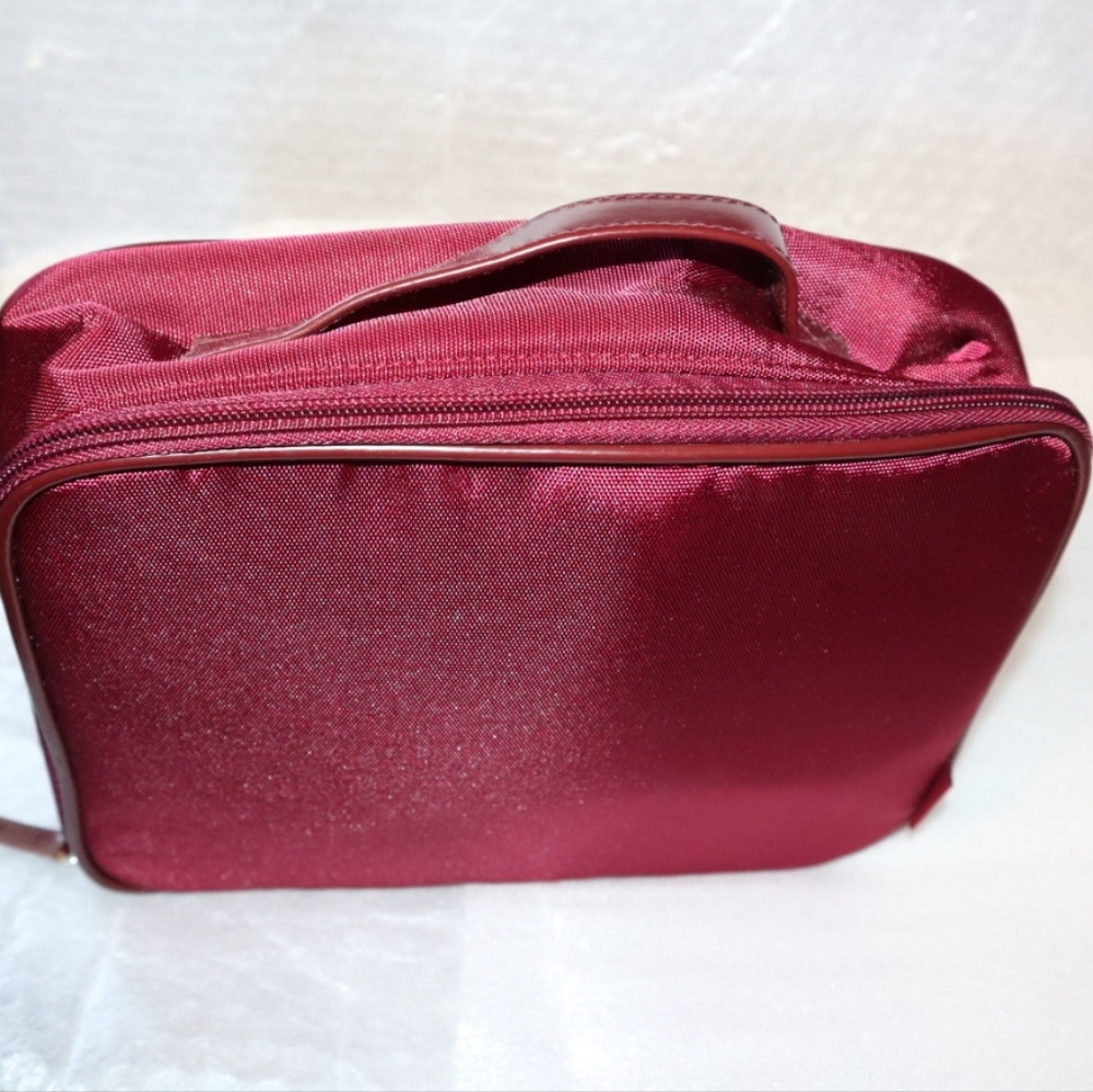 Shiseido‎ burgundy or maroon satin cosmetic or toiletry bag